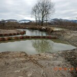 Geflutete Baugrube der Brücke 3